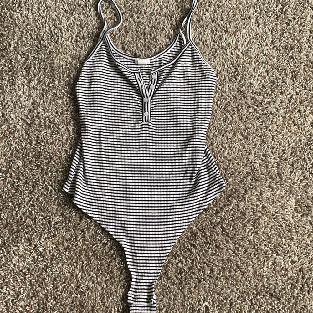 Stripped body suit